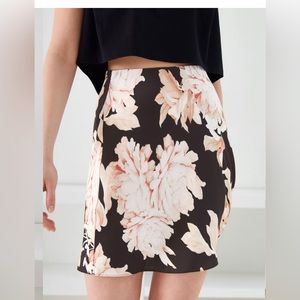 Beautiful Babaton mini floral slip skirt, size 8. From Aritzia.